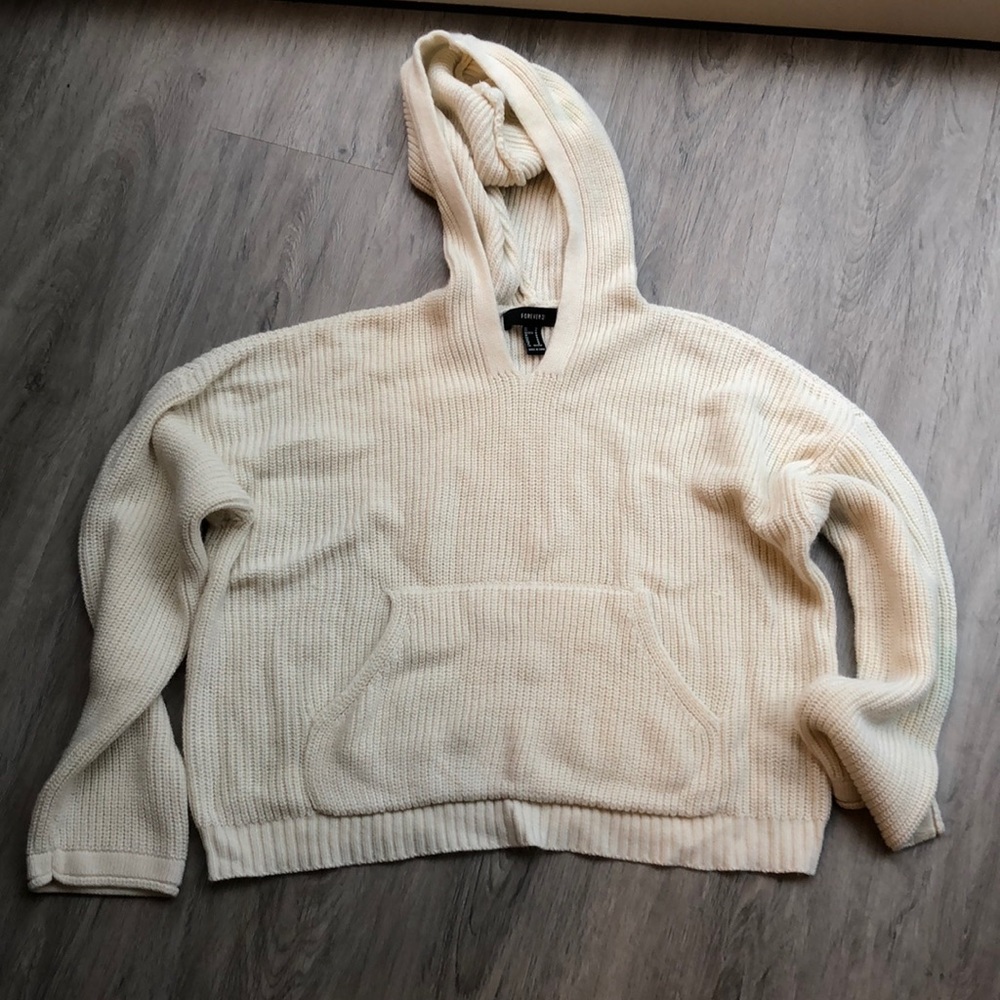 Cream colored oversized hooded sweater